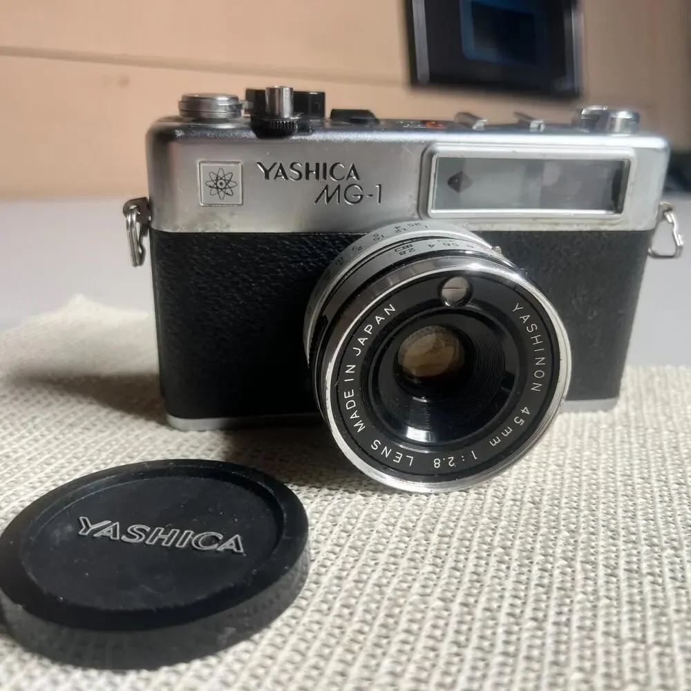 Yashica MG-1 35mm Rangefinder Film Camera 45mm f/2.8 Lens Made in‎ Hong Kong Cap